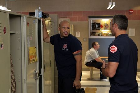 Taylor Kinney and Joe Minoso in Chicago Fire (2012)