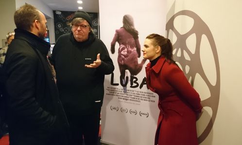 Vladimir Jon Cubrt and Nicole Maroon (Luba) chat with Michael Moore after the Women's International Film Festival screen