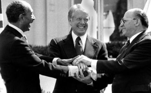Menachem Begin, Jimmy Carter, and Anwar Sadat in Begin: The Leadership Years (2019)