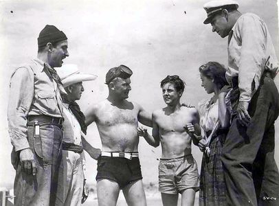 Eddie Albert, Martin Garralaga, Henry Orozco, Ray Teal, Elena Verdugo, and Bobby Cooper in Strange Voyage (1946)