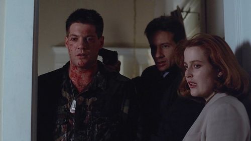 Gillian Anderson, David Duchovny, and Kevin Conway in The X-Files (1993)