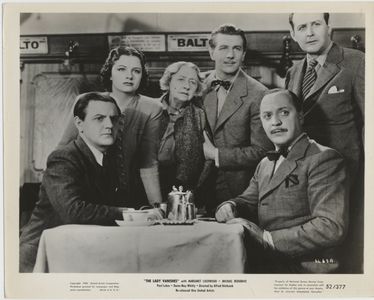 Margaret Lockwood, Cecil Parker, Basil Radford, Michael Redgrave, Naunton Wayne, and May Whitty in The Lady Vanishes (19