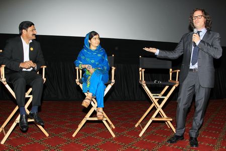 Davis Guggenheim, Malala Yousafzai, and Ziauddin Yousafzai at an event for He Named Me Malala (2015)
