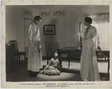 Mary Astor, Kuulei De Clercq, and Raymond Massey in The Hurricane (1937)