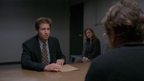 Gillian Anderson, David Duchovny, and Paul Sand in The X-Files (1993)