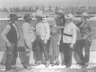John Wayne, Roscoe Ates, Stanley Blystone, Ray Corrigan, Ralph Graves, and Carole Landis in Three Texas Steers (1939)