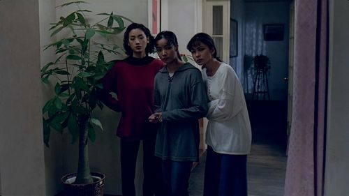 Yu-Wen Wang, Chien-Lien Wu, and Kuei-Mei Yang in Eat Drink Man Woman (1994)