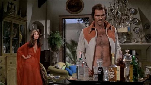 Burt Reynolds and Anitra Ford in The Longest Yard (1974)