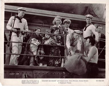 Louis Adlon, Edwin Brian, Darryl Hickman, Carole Landis, Onslow Stevens, and Roland Varno in Mystery Sea Raider (1940)