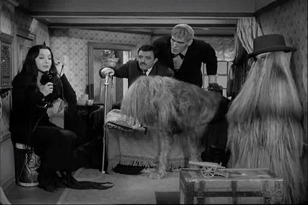 John Astin, Ted Cassidy, Carolyn Jones, and Felix Silla in The Addams Family (1964)