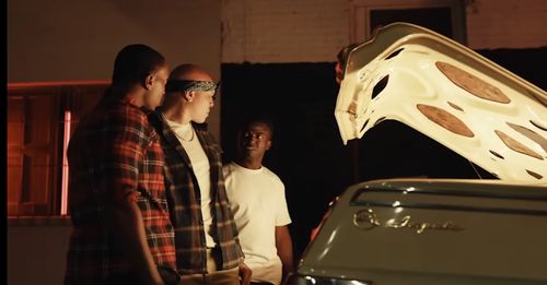 Myles Grier in 'Pop That Trunk' Music Video by Juicy J and Wiz Khalifa