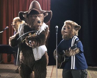 Zeb Zoober (left), master of the fiddle and founding member of the influential rock group The Country Bears, jams with 1