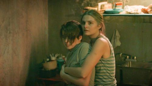 Stefanie Scott and Braxton Bjerken in Girl in the Basement (2021)