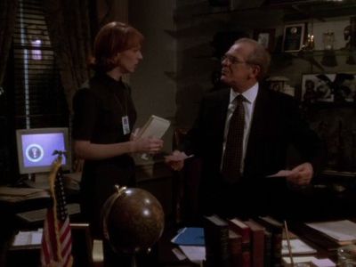NiCole Robinson and John Spencer in The West Wing (1999)