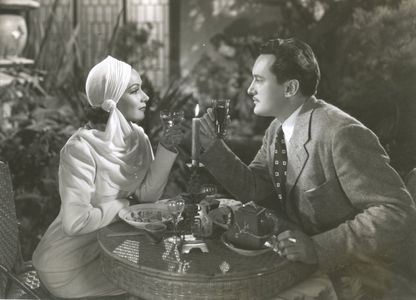 George Sanders and Dolores del Rio in International Settlement (1938)