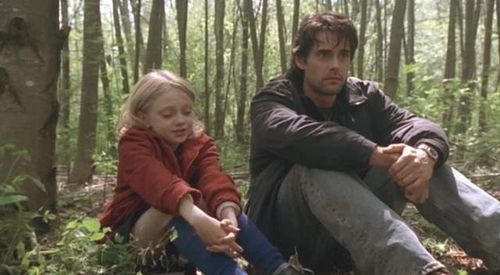 Dakota Fanning and Adam Kaufman in Taken (2002)