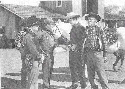 Johnny Carpenter, Sunset Carson, Bud Geary, and Olin Howland in Santa Fe Saddlemates (1945)