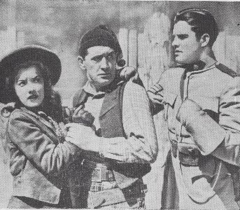 Jack Ingram, Robert Kellard, and Nell O'Day in Perils of the Royal Mounted (1942)
