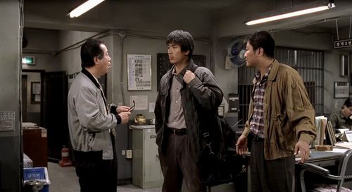 Song Kang-ho, Kim Sang-kyung, and Byun Hee-Bong in Memories of Murder (2003)