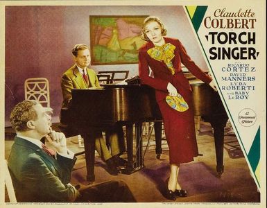 Claudette Colbert and Albert Conti in Torch Singer (1933)