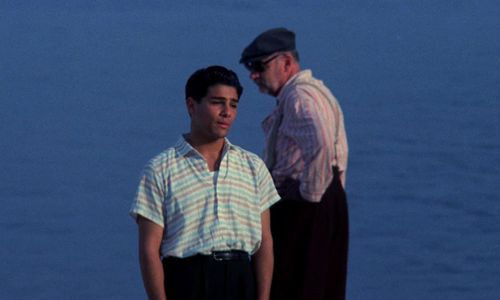 Marco Leonardi and Philippe Noiret in Cinema Paradiso (1988)