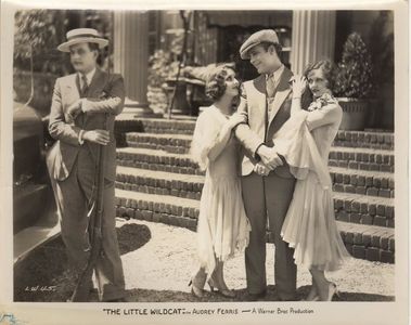 Hallam Cooley, Doris Dawson, Audrey Ferris, and James Murray in The Little Wildcat (1928)