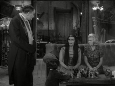 Yvonne De Carlo, Al Lewis, Butch Patrick, and Pat Priest in The Munsters (1964)