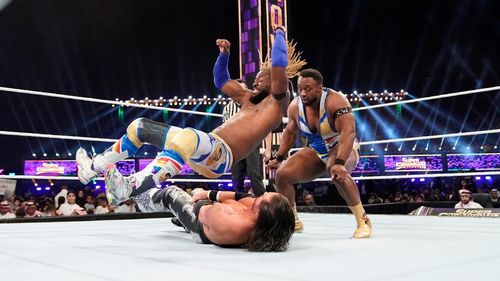 John Hennigan, Kofi Kingston, and Ettore Ewen in WWE Super Show-Down (2020)