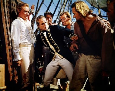 Marlon Brando, Richard Harris, Trevor Howard, and Percy Herbert in Mutiny on the Bounty (1962)