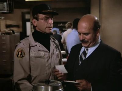 René Enríquez and James Sikking in Hill Street Blues (1981)