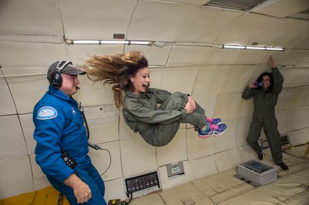 Emily floating weightless in the Vomit Comet for Xploration Outer Space