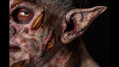 Demon prosthetic makeup painted and applied by Midian Crosby, assisted by Brittany Beyer. RBFX prosthetics.