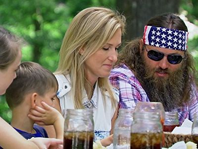 Willie Robertson, Korie Robertson, and River Robertson in Duck Dynasty (2012)