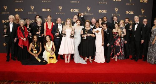 The Handmaid's Tale cast and crew pose with their Emmys.