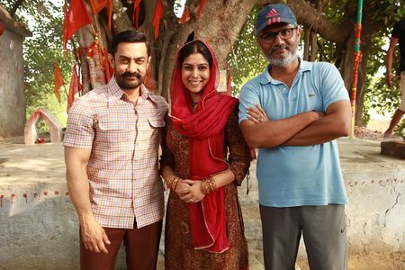 Aamir Khan, Sakshi Tanwar, and Nitesh Tiwari in Dangal (2016)
