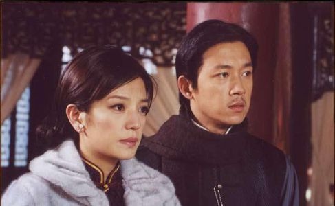 Yueming Pan and Wei Zhao in Moment in Peking (2005)