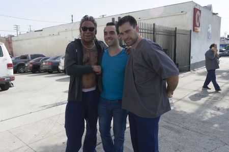 Director Aziz Tazi with Mickey Rourke and Sean Stone posing for the Daily Mail outside his set in Los Angeles