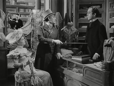Alec Guinness, Dennis Price, and Anne Valery in Kind Hearts and Coronets (1949)