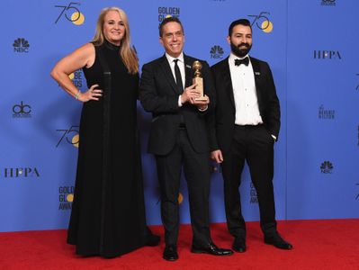 Darla K. Anderson, Lee Unkrich, and Adrian Molina at an event for 75th Golden Globe Awards (2018)
