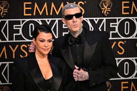 Travis Barker and Kourtney Kardashian at an event for The 75th Primetime Emmy Awards (2024)