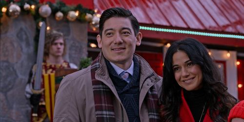 Emmanuelle Chriqui and Scott Ryan Yamamura in The Knight Before Christmas (2019)