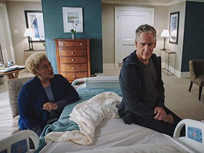 Scott Bakula and CCH Pounder in NCIS: New Orleans: The Man in the Red Suit (2020)