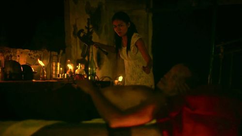 Arthur Acuña and Chanel Latorre in Woman of the Ruins (2013)