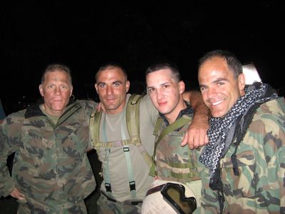 David Warshofsky, USMC Sgt. Eric Kocher, Traverse Le Goff and Michael Kelly on the set of Generation Kill.