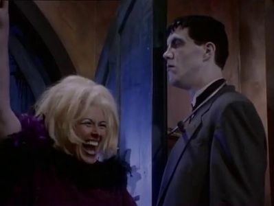John DeSantis and Meredith Bain Woodward in The New Addams Family (1998)