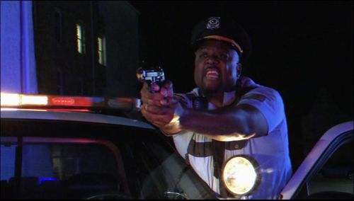 Ronald Melton Braxton as Cop