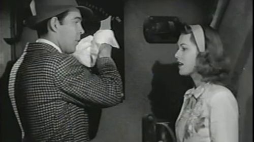 Richard Bailey and Linda Stirling in Manhunt of Mystery Island (1945)