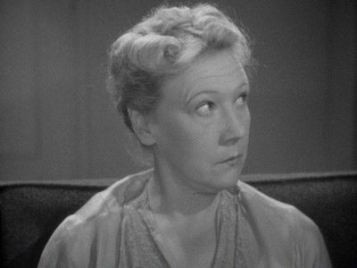 Claire Whitney in When Strangers Marry (1944)