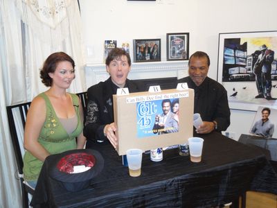 Hosts Derek Maki and Sheila Myjo try to see if actor Billy Dee Williams can find the correct glass of CLOT 45 in a blind