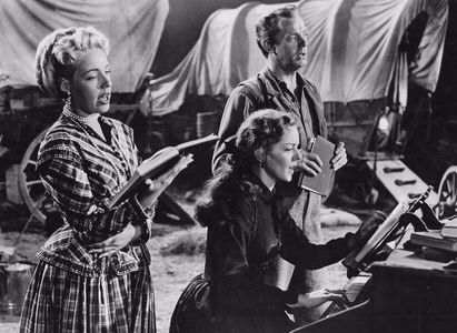 Mary Beth Hughes, Dennis O'Keefe, and Arleen Whelan in Passage West (1951)